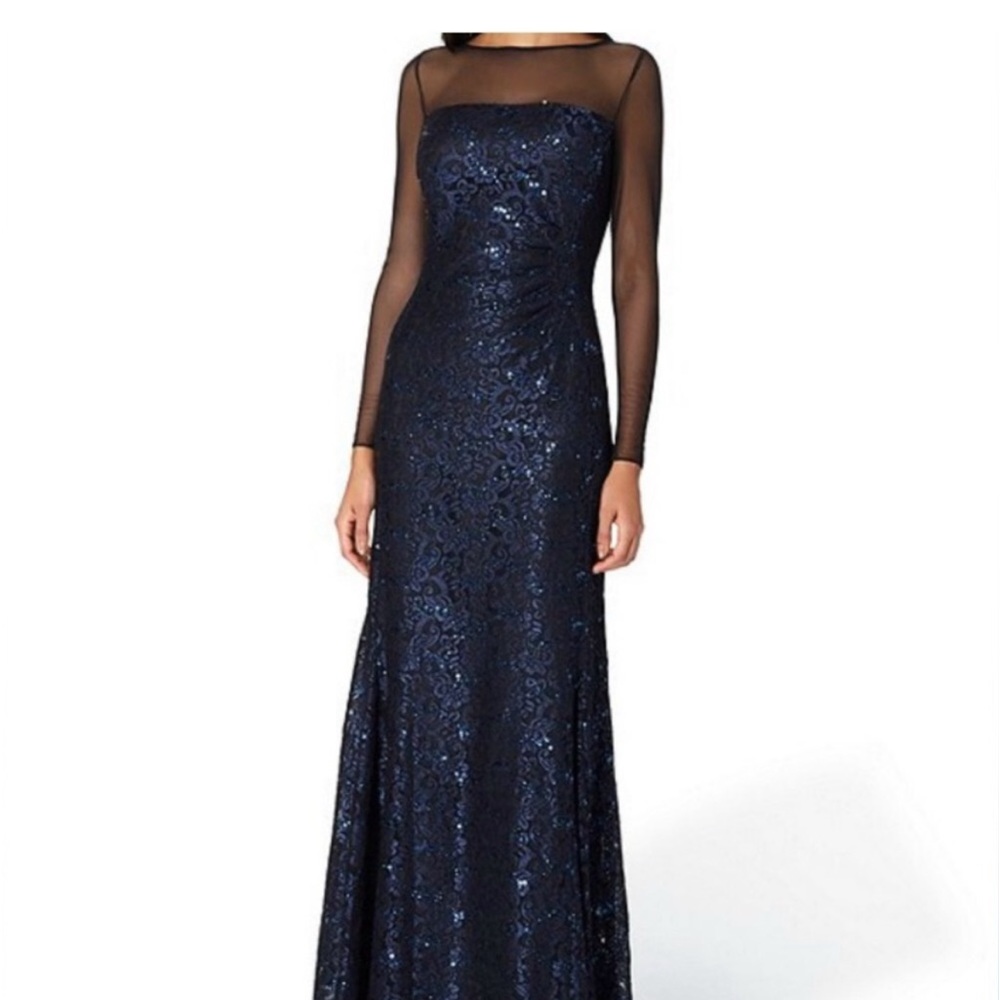 Elegant long blue dress. Worn once.Blue sequins. Top part has black mesh.
